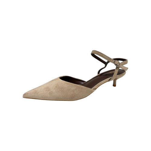 So and Ro beige suede-like pointed toe kitten heels with ankle strap and buckle closure.