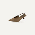 So and Ro beige suede slingback heels with pointed toe and kitten heel. Adjustable ankle strap.
