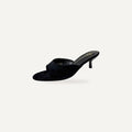 So and Ro black suede kitten heel mules with a minimalist design and refined heel.