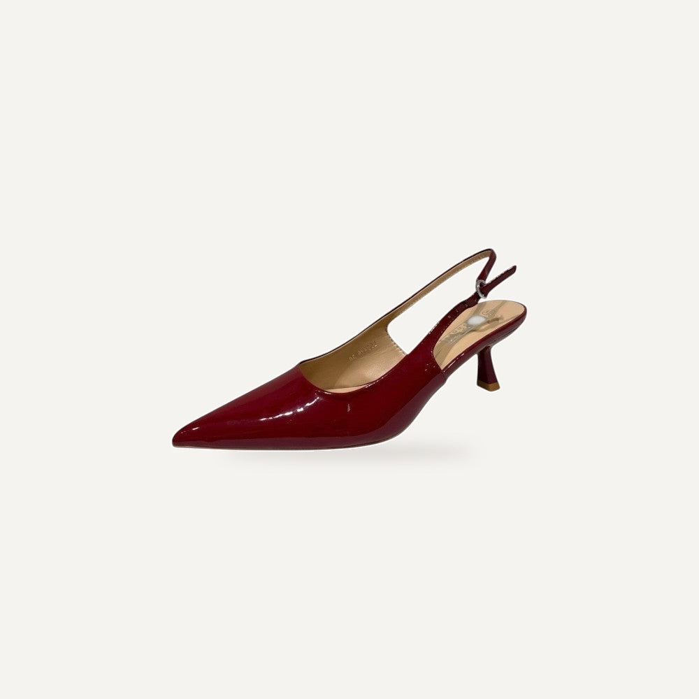 So and Ro burgundy patent leather pointed toe slingback heels with sculpted heel.