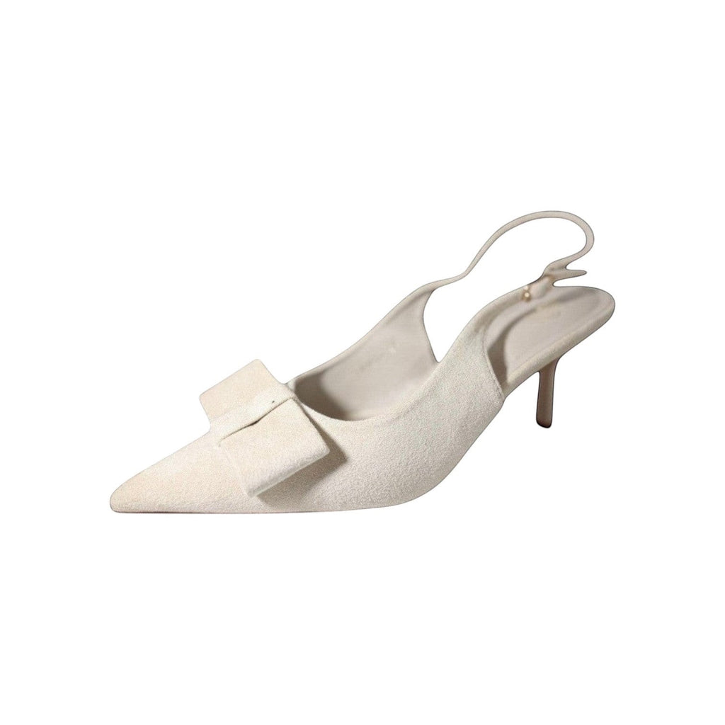 So and Ro cream textured fabric pointed toe slingback heels with bow accent and adjustable strap.