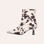So and Ro - shoes and more - XTI Selinas enkellaarsjes met hak in een trendy bruin-witte animal print en puntige neus