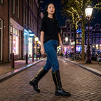 So and Ro - shoes and more - Tina zwarte laars met lederlook en metalen rits gedragen door vrouw in Amsterdam